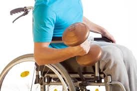 wheelchair user lifting weights